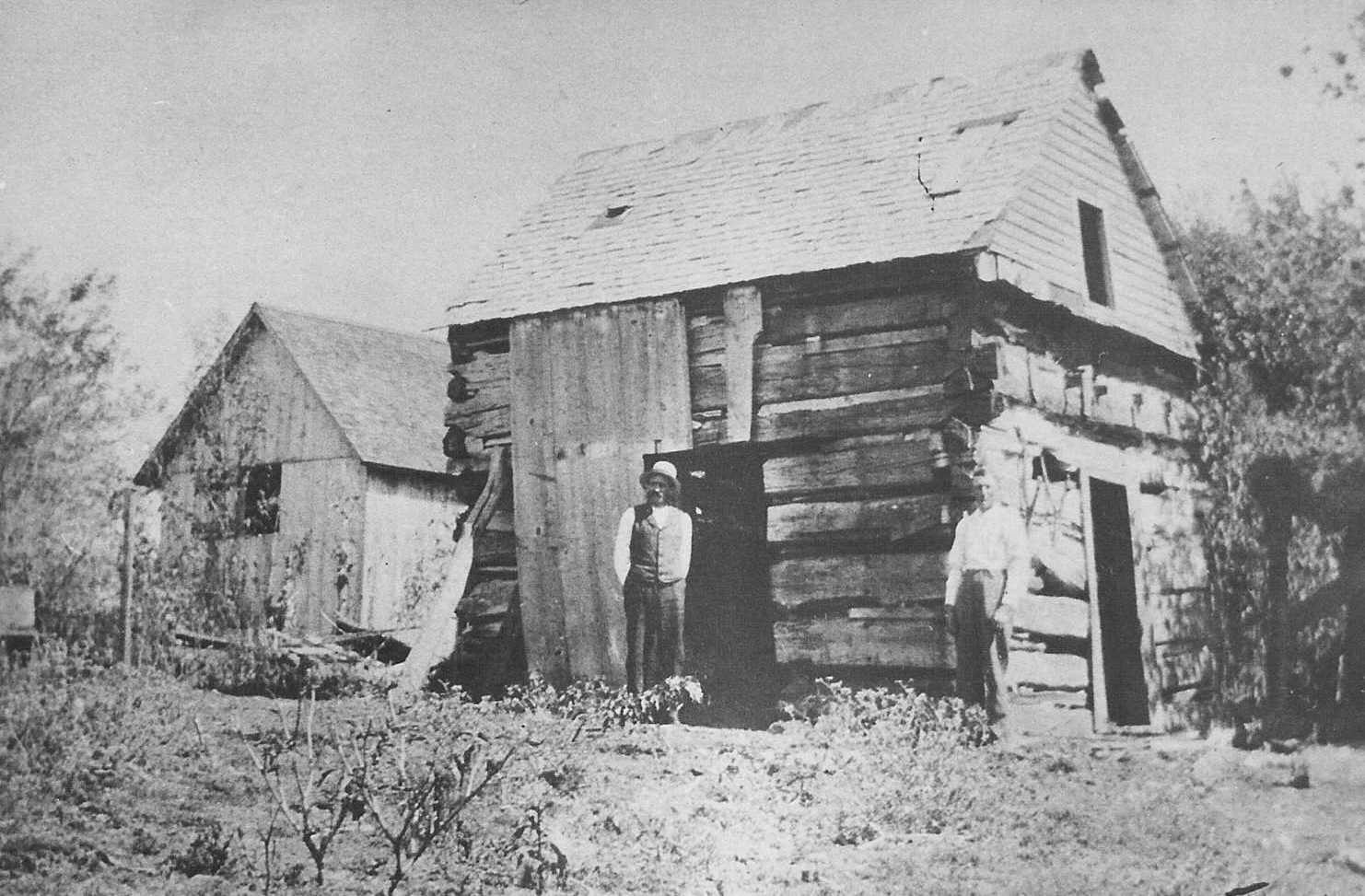 1862 – Earl Rogler and Nichol-Gosler in front of what may be John Rogler cabin and homestead.